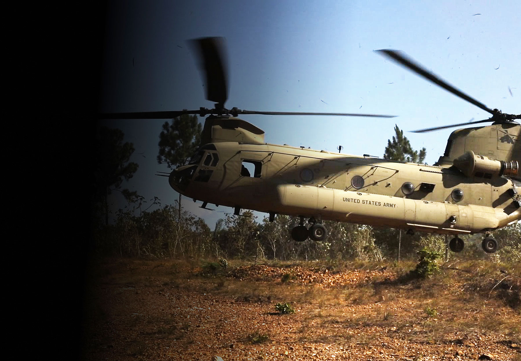 CH-47 Chinook landing in a clearing